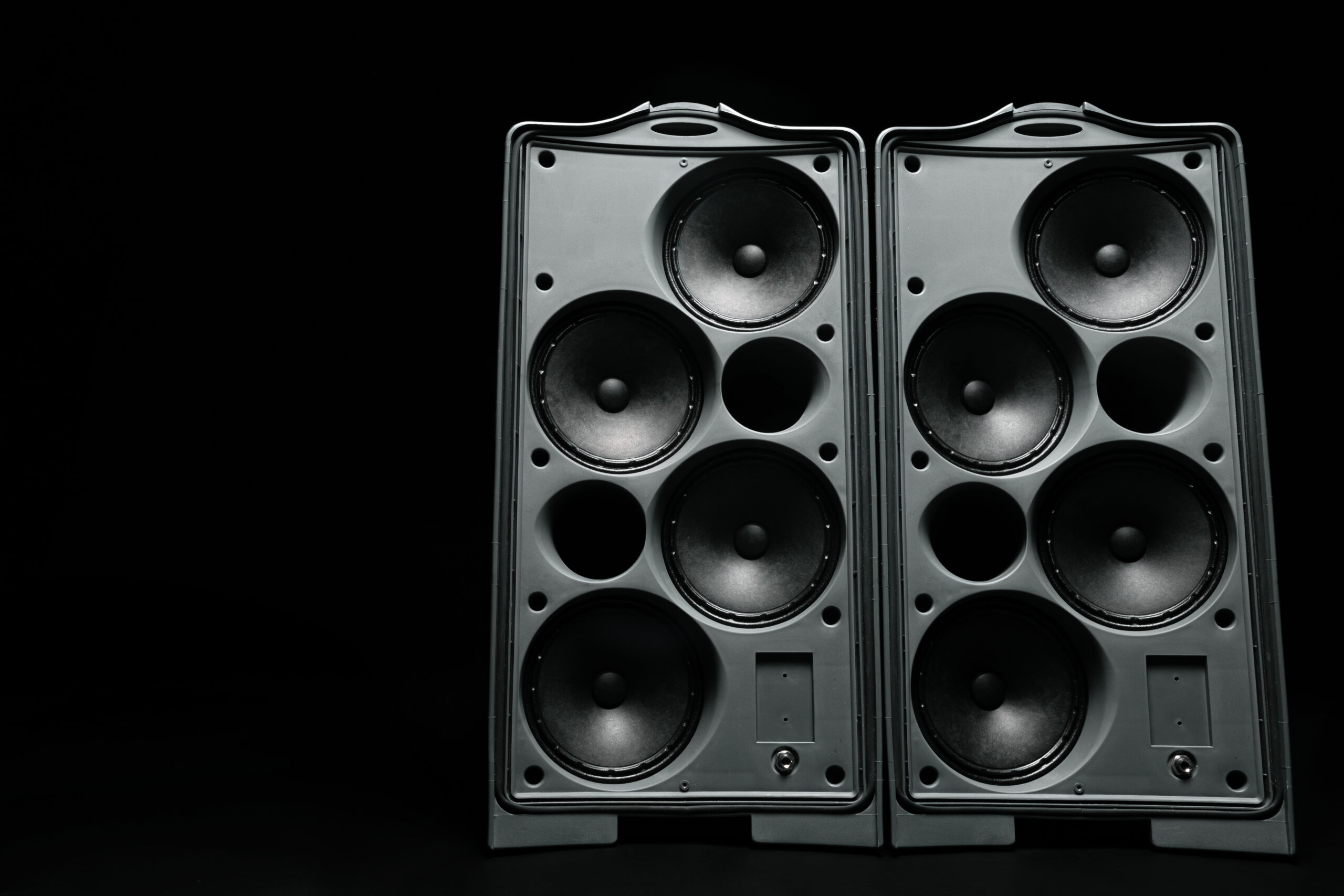 Audio system stereo column on dark background close up