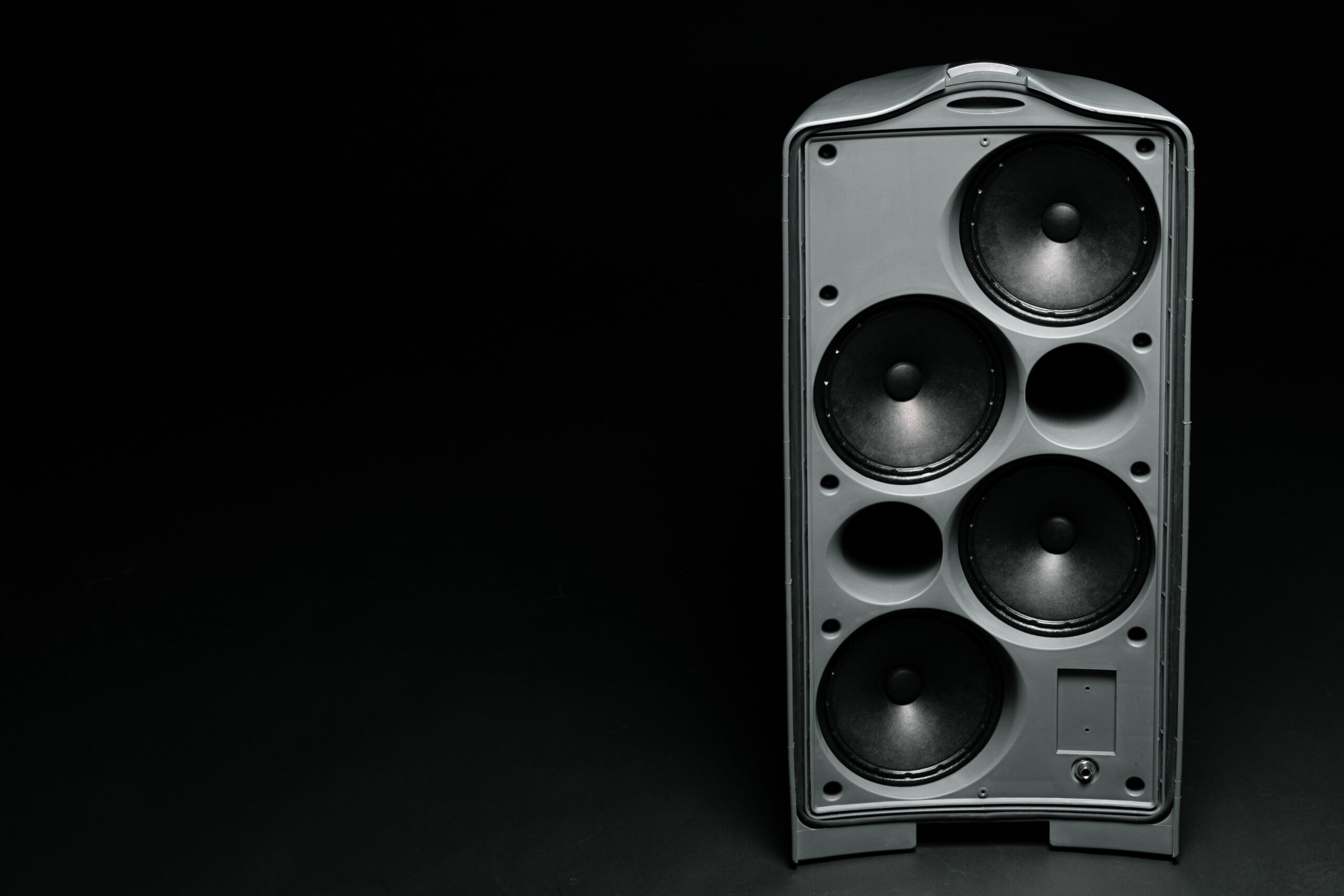 Audio system stereo column on dark background close up